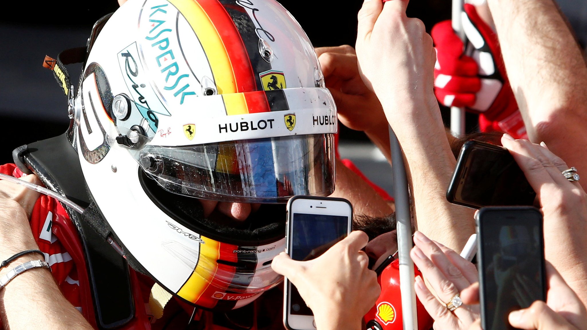 Vettel leapfrogs Hamilton to win season opener