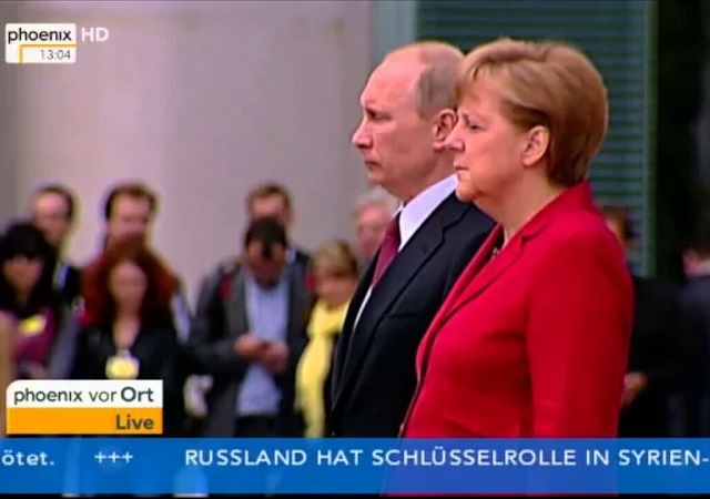 Merkel Teams Up with Putin to Save Iran Deal