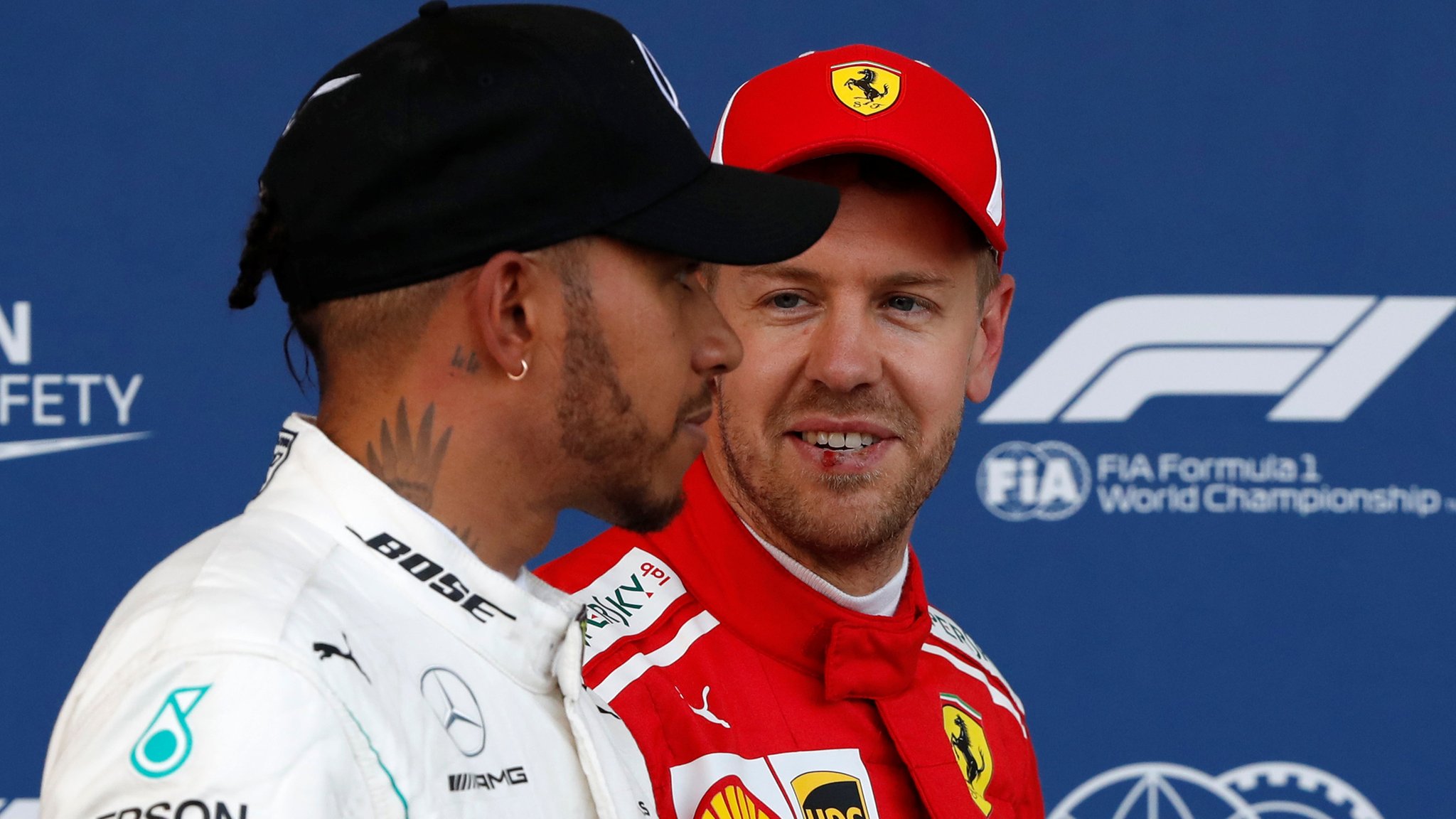 101085424_hamilton_vettel_reuters.jpg