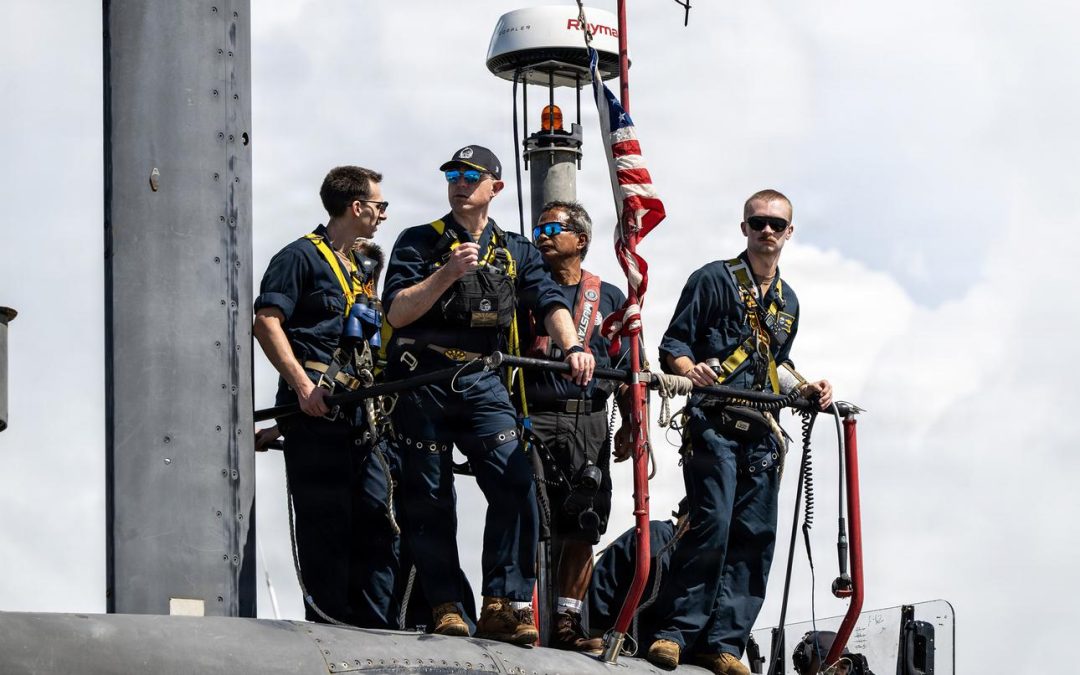 Fast-attack submarine USS Tucson trades places in Guam with USS Jefferson City