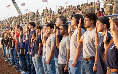 Saddle up: Military enlistees take the oath at the rodeo